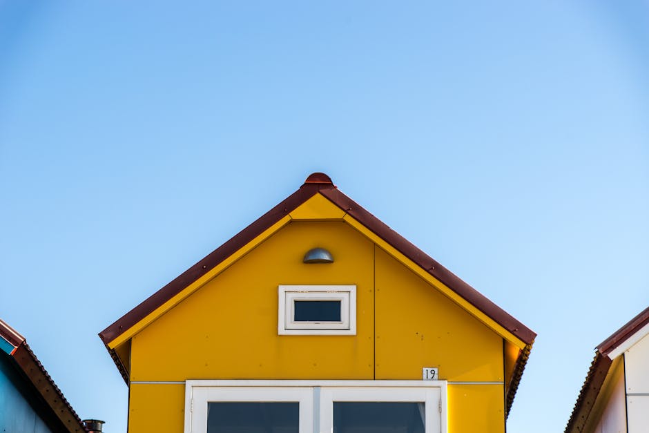 Modern residential home exterior showcasing professional architecture and roofing